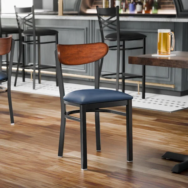 Lancaster Table & Seating Boomerang Black Finish Chair with Navy Vinyl Seat and Antique Walnut Wood Back - Unassembled Lancaster Table & Seating Boomerang Black Finish Chair with Navy Vinyl Seat and Antique Walnut Wood Back - Unassembled
