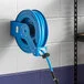 Regency Blue Powder-Coated Steel Open Air / Water Hose Reel with 50' x 3/4 Regency Blue Powder-Coated Steel Open Air / Water Hose Reel with 50' x 3/4