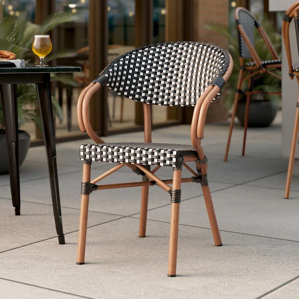 Lancaster Table & Seating Bistro Black and White Checkered Weave Rattan Outdoor Arm Chair Lancaster Table & Seating Bistro Black and White Checkered Weave Rattan Outdoor Arm Chair
