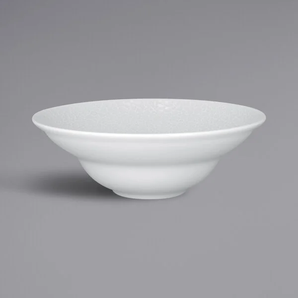 RAK Porcelain Charm 10.8 oz. Bright White Embossed Wide Rim Round Extra Deep Porcelain Plate - 6/Case RAK Porcelain Charm 10.8 oz. Bright White Embossed Wide Rim Round Extra Deep Porcelain Plate - 6/Case