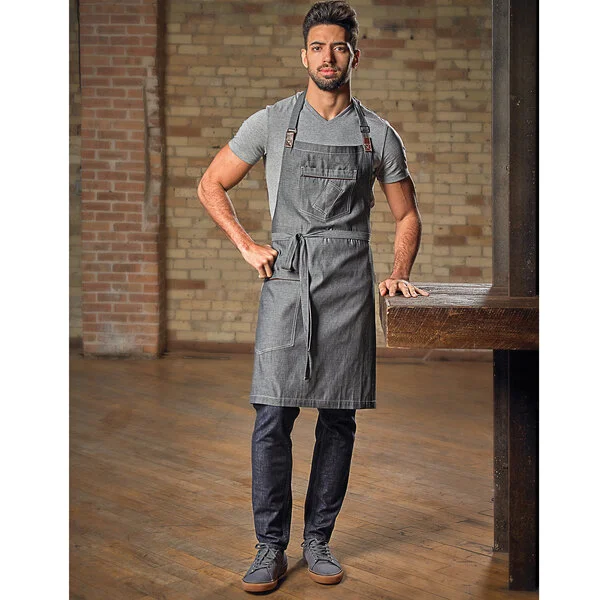 Mercer Culinary M63200DEN Metro Edge Flannery Indigo Dobby Denim Bib Apron with Adjustable Neck, Leather Towel Holder, and 3 Pockets - 34 1/4