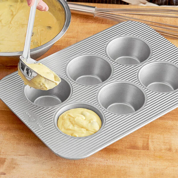 Chicago Metallic 26500 6 Cup 8.2 oz. Glazed Aluminized Steel Texas Jumbo Pecan Roll / Muffin Pan - 11 1/8 Chicago Metallic 26500 6 Cup 8.2 oz. Glazed Aluminized Steel Texas Jumbo Pecan Roll / Muffin Pan - 11 1/8