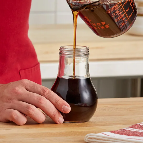 Vollrath 214J Traex® Dripcut® 14 oz. Glass Teardrop Syrup Server Jar