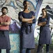 Uncommon Chef 3107 Indigo Customizable 100% Cotton Denim Underground Bistro Apron with Black Webbing and 3 Pockets - 24 Uncommon Chef 3107 Indigo Customizable 100% Cotton Denim Underground Bistro Apron with Black Webbing and 3 Pockets - 24