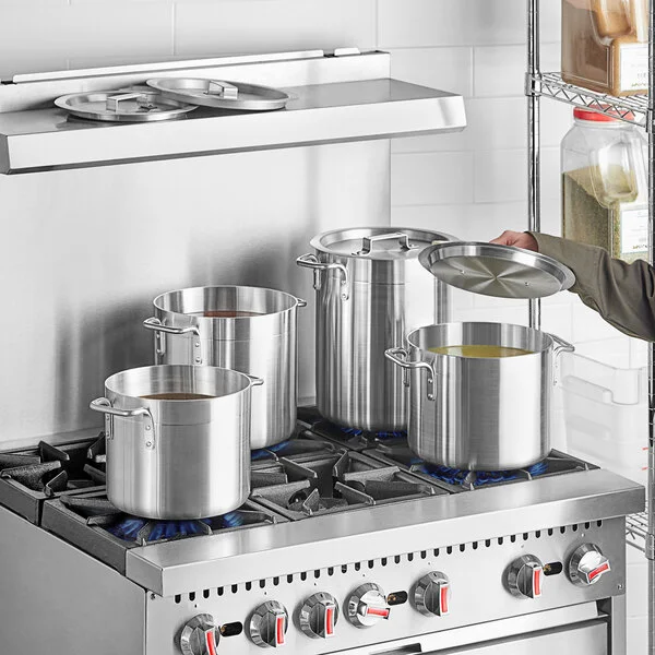 Choice 8-Piece Standard Weight Aluminum Stock Pot Set with 8 Qt., 10 Qt., 12 Qt., and 16 Qt. Pots and Covers