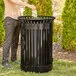 Lancaster Table & Seating 45 Gallon Heavy-Duty Round Black Steel Slatted Outdoor Trash Can with Flat Lid and Door Lancaster Table & Seating 45 Gallon Heavy-Duty Round Black Steel Slatted Outdoor Trash Can with Flat Lid and Door