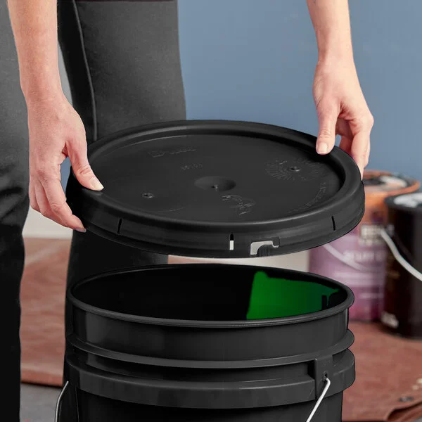 BWAY 5 Gallon Black Round Pail Cover with Tear Skirt and Gasket - 10/Case BWAY 5 Gallon Black Round Pail Cover with Tear Skirt and Gasket - 10/Case