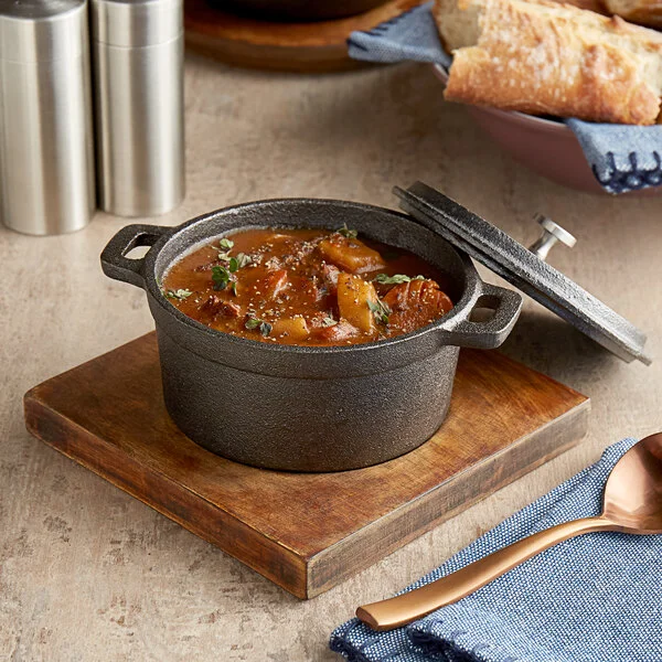 Valor 16 oz. Pre-Seasoned Mini Cast Iron Pot with Square Rustic Chestnut Finish Rubberwood Underliner