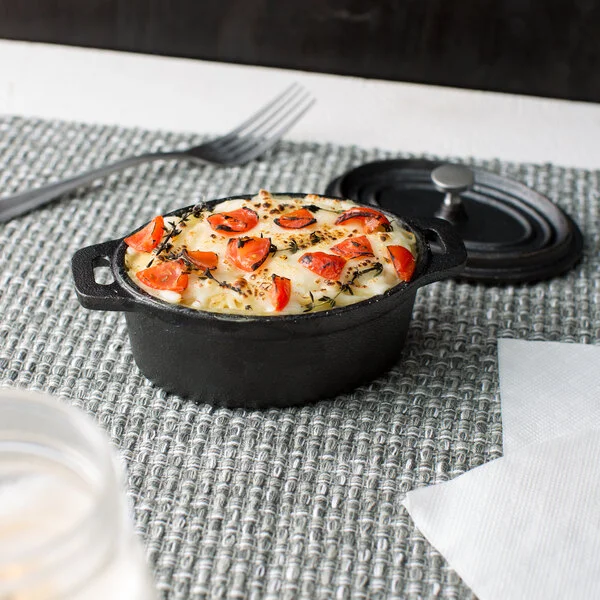 American Metalcraft CIPOV63 11 oz. Pre- Seasoned Mini Cast Iron Oval Dutch Oven American Metalcraft CIPOV63 11 oz. Pre- Seasoned Mini Cast Iron Oval Dutch Oven