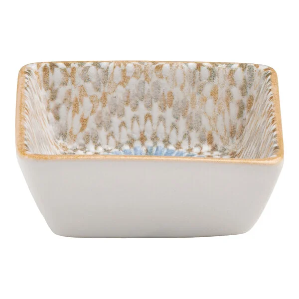 Ariane Cruise Tangier 1.69 oz. Square Blue and Orange Porcelain Ramekin with Ivory Exterior - 18/Case Ariane Cruise Tangier 1.69 oz. Square Blue and Orange Porcelain Ramekin with Ivory Exterior - 18/Case