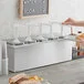 ServSense Quintuple 2 Qt. Stainless Steel Condiment Dispenser - 5 Plastic Pumps, 1 oz. Portions ServSense Quintuple 2 Qt. Stainless Steel Condiment Dispenser - 5 Plastic Pumps, 1 oz. Portions