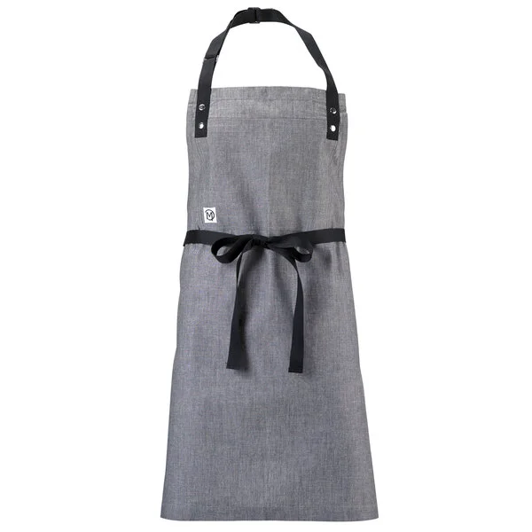 Mercer Culinary M63205GRY Metro Edge Odin Gray Chambray Bib Apron with Adjustable Neck, Black Webbing, and 1 Pocket - 32 Mercer Culinary M63205GRY Metro Edge Odin Gray Chambray Bib Apron with Adjustable Neck, Black Webbing, and 1 Pocket - 32