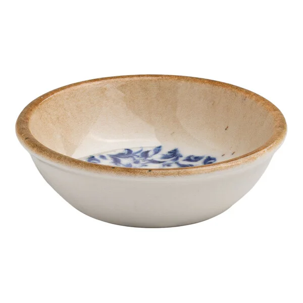 Ariane Cruise Amalfi 1.69 oz. Round White Porcelain Ramekin with Blue Floral Center and Tan Rim - 18/Case Ariane Cruise Amalfi 1.69 oz. Round White Porcelain Ramekin with Blue Floral Center and Tan Rim - 18/Case