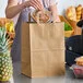 Choice 1/8 65 lb. Heavy-Duty Natural Kraft Paper Barrel Sack with Flat Handles - 300/Case Choice 1/8 65 lb. Heavy-Duty Natural Kraft Paper Barrel Sack with Flat Handles - 300/Case