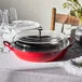 Staub 3.5 Qt. Cherry Enameled Cast Iron Brazier with Glass Lid 1003539 Staub 3.5 Qt. Cherry Enameled Cast Iron Brazier with Glass Lid 1003539
