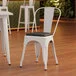 Lancaster Table & Seating Alloy Pearl White Indoor Cafe Chair with Black Vinyl Cushion Lancaster Table & Seating Alloy Pearl White Indoor Cafe Chair with Black Vinyl Cushion